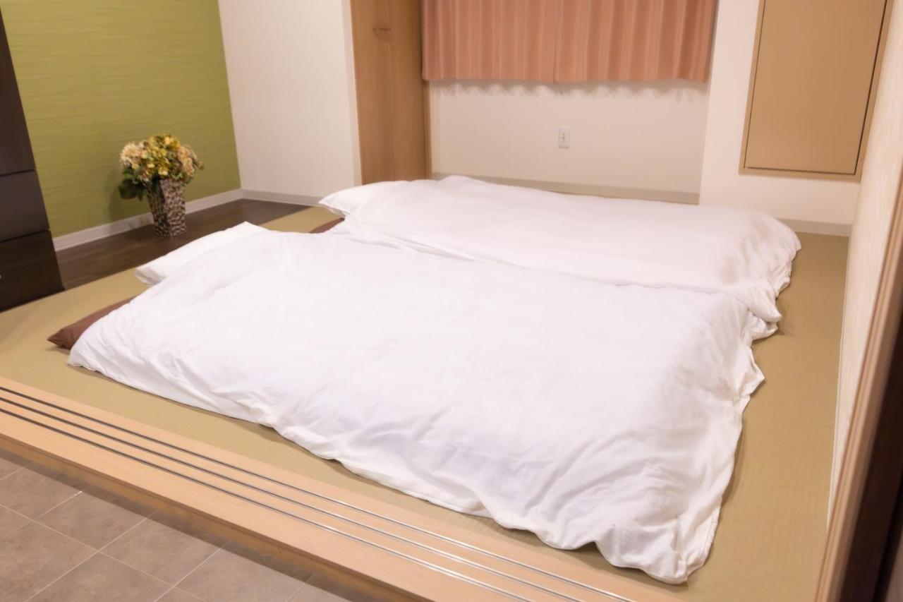 マンションかわた Apartment Osaka Bagian luar foto